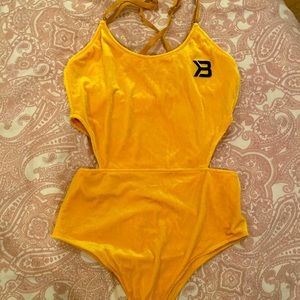Better Bodies yellow velvet side cropped onesie